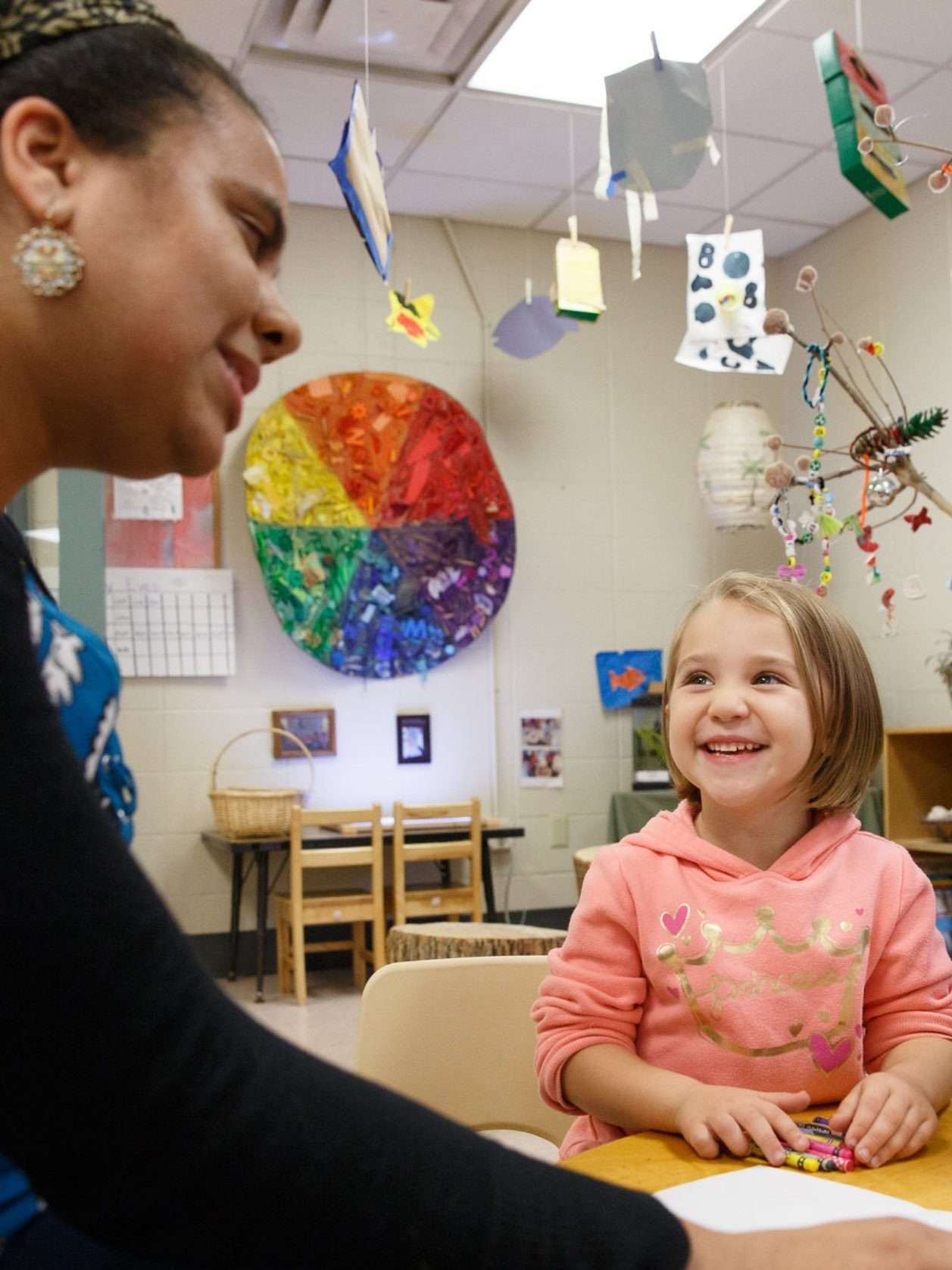 Woman sitting with child